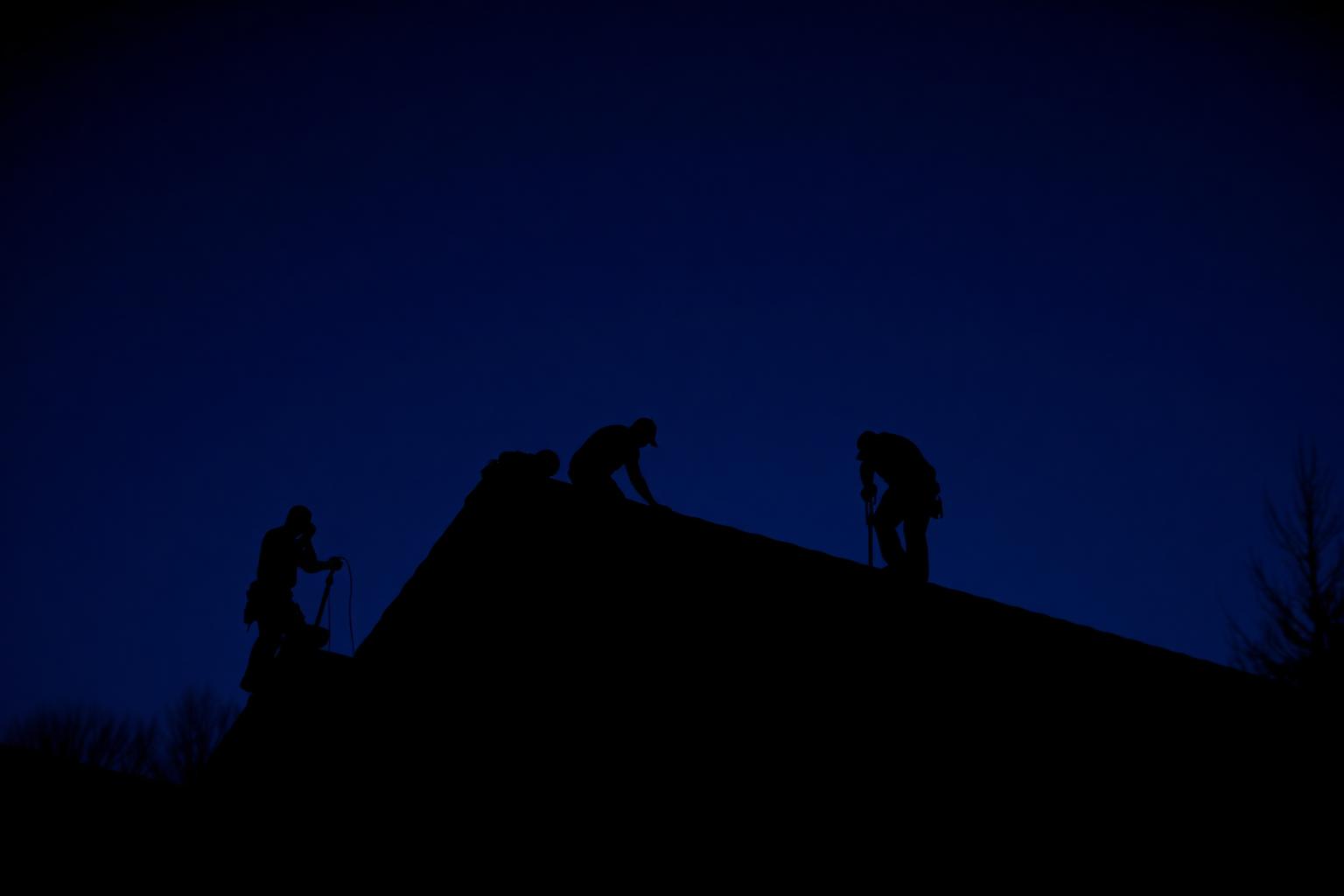 Roofing crew on an active job site